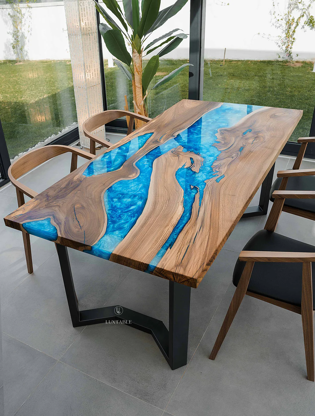 Luxury walnut blue resin dining table Wave with solid European walnut, vibrant blue epoxy resin, straight edges, and anthracite M-shaped metal legs
