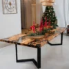 Clear olive wood epoxy dining table Amarante with ancient olive wood, transparent clear epoxy resin, live edges, and matte black metal legs