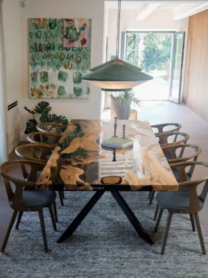 Luxury olive wood resin dining table Enigma with premium olive wood, glossy smoke gray resin, and matte black metal base