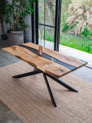 Smoke gray oak epoxy dining table Frida with centuries-old oak wood, transparent smoke gray resin, and matte anthracite X-shaped metal legs