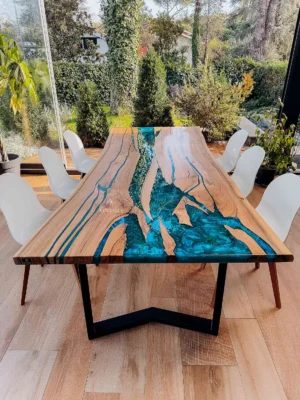 Luxury walnut resin dining table Oceania with solid European walnut, turquoise epoxy resin, live edges, and matte black M-shaped metal legs